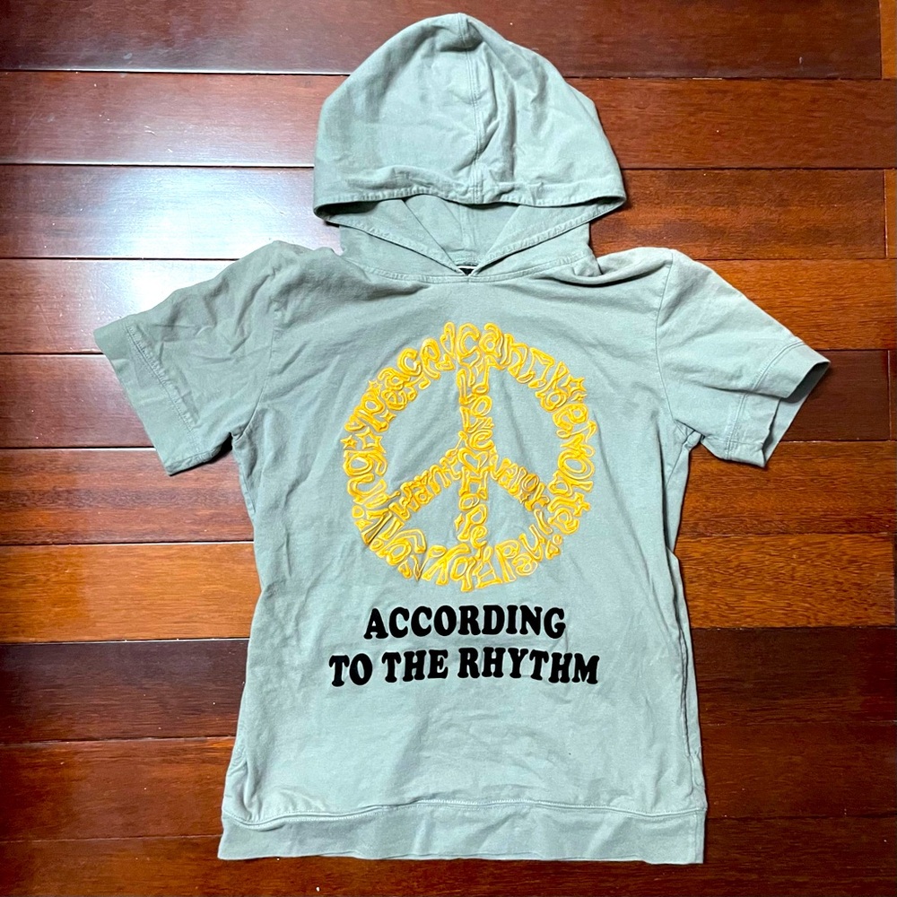 grey peace sign short sleeve hoodie with orange lettering